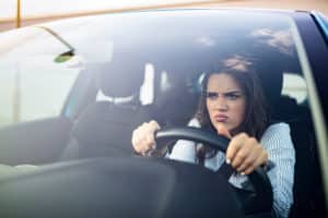 Stressed,woman,driver,sitting,inside,her,car.,angry,female,driver