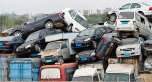 A,pile,of,abandoned,cars,on,junkyard.