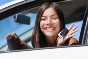 Happy Asian Girl Teen Driver Showing New Car Keys